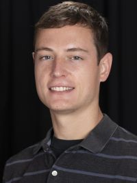 A headshot of Patrick McHugh