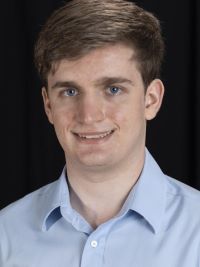 A headshot of Torey Hilbert